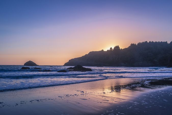 Cliffs and rocks of the pacific north west during beautiful blue pink sunset