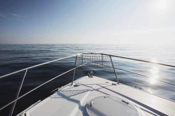 Yacht bow over blue ocean