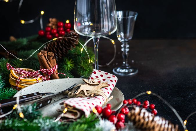 Christmas table setting with fern and dried orange slices