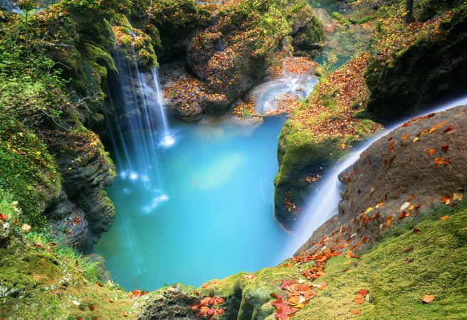 Amazing waterfalls of aquifer with bright vegetation