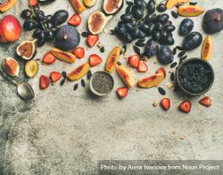 Fruit assortment with figs, grapes, peaches, spoon, chia seeds,  horizontal composition, copy space 0WNDyb