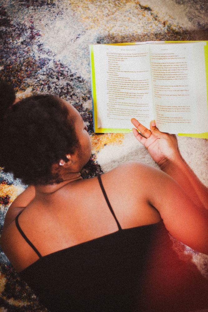 Young woman reading a book