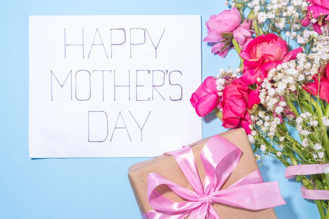 Mothers day gift and flowers background