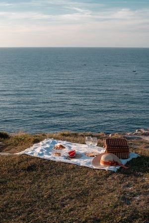 Picnic mat with romantically set near sea and mountains