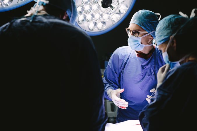 Surgeons team discussing during surgery