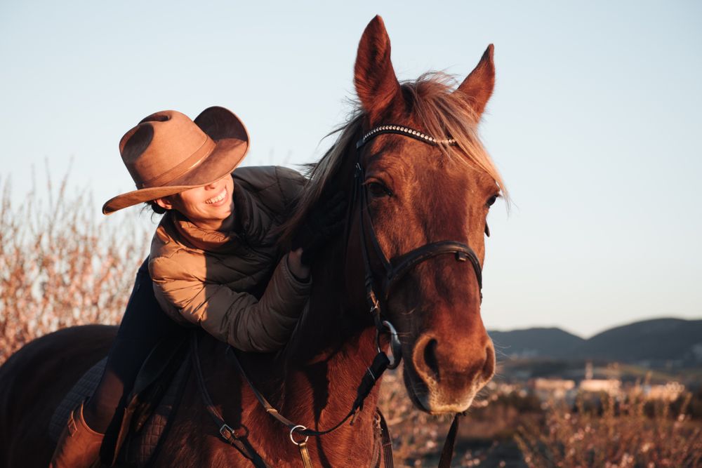 Woman riding horse
