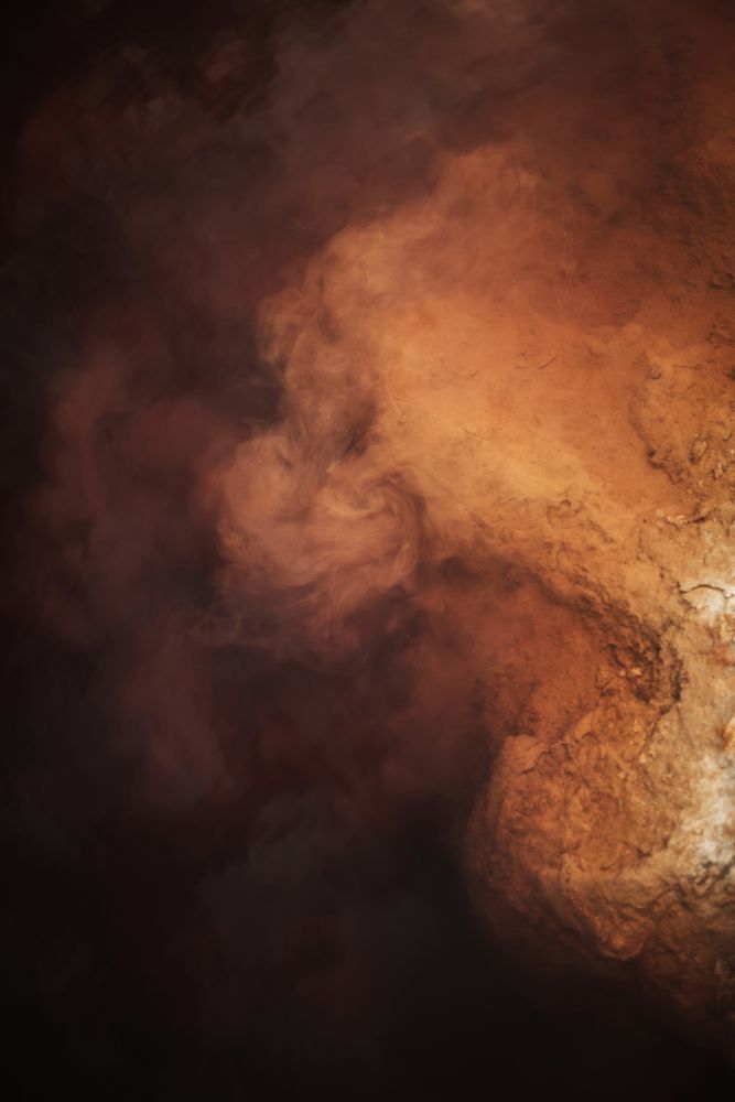 Smoke over water in brown light