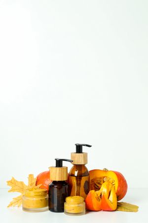 Skin care and face care concept - pumpkin cosmetic