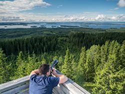 Man taking photos of beautiful landscape