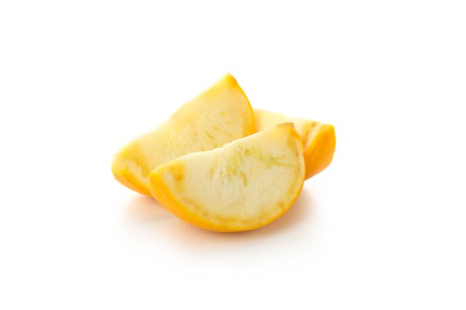 Fresh zucchini slices isolated on blank background