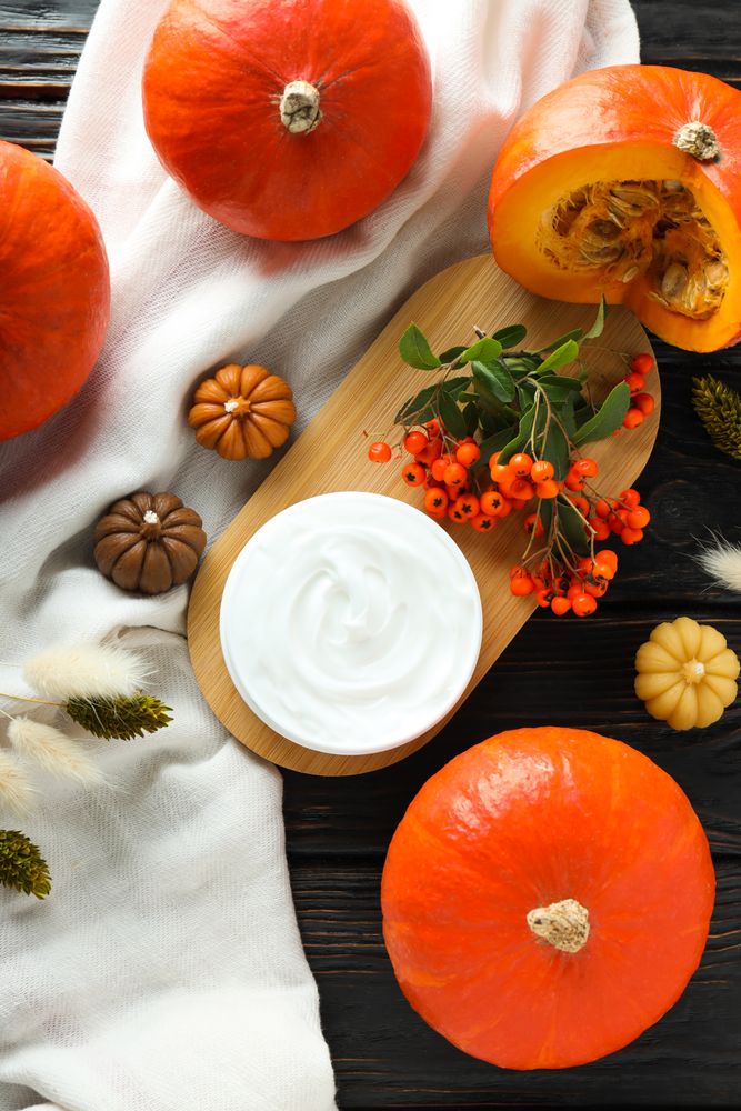 Concept of different cosmetic products, Pumpkin cosmetics, top view
