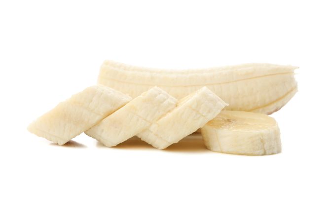Chopped banana isolated on studio background. Fresh fruit