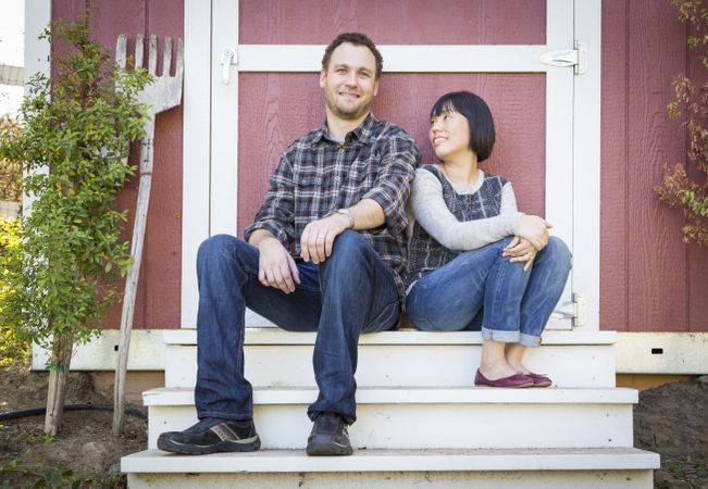 Interracial Couple Relaxing on the Steps
