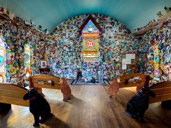 Hundreds of messages from dog lovers are tacked to the walls at the Dog Chapel, St. Johnsbury