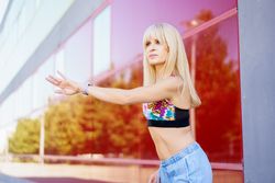 Modern ballerina performing a choreography in the street