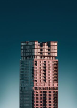 Unique residential building against a dark blue sky