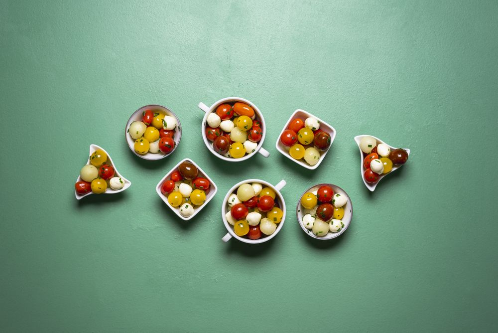 Salad with tomatoes and mozzarella, portions
