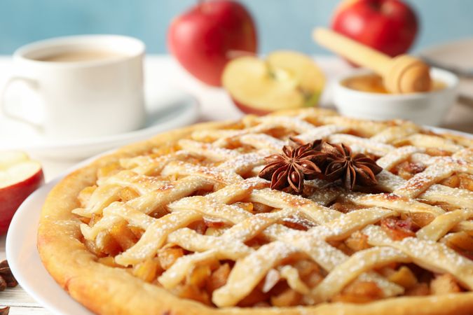 Composition with apple pie and ingredients on wooden background. Homemade food