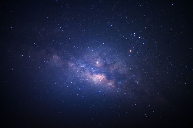 The milky way galaxy with stars and space dust in the universe, Long exposure photograph, with grain