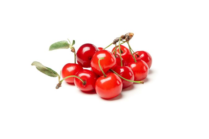 Fresh red cherry isolated on plain background