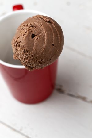 Chocolate ice cream cone in red cup