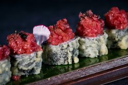 Delicious uramaki sushi rolls with raw tuna