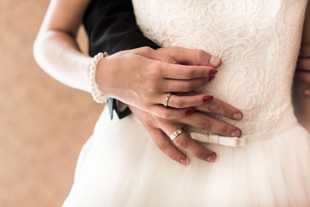 Bride and groom hugging