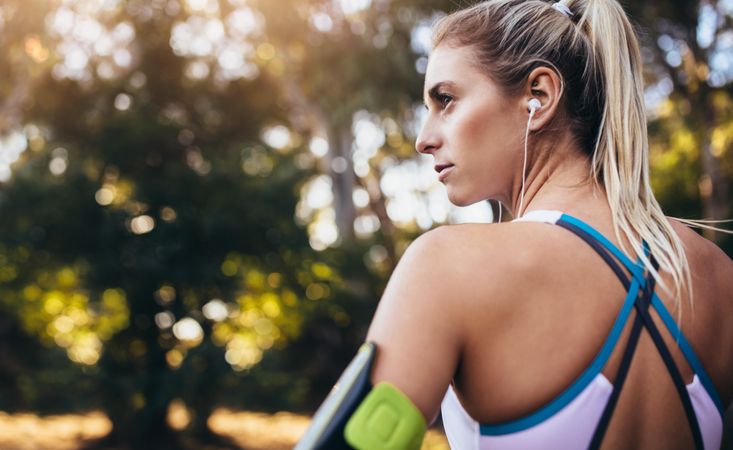Woman listening to music during workout