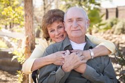 Happy Mature Couple Relaxing in The Park