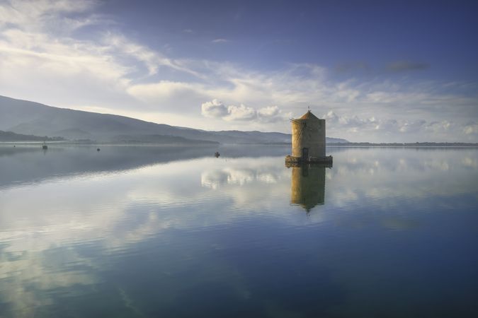 Old Spanish windmill in Orbetello lagoon, Argentario, Italy