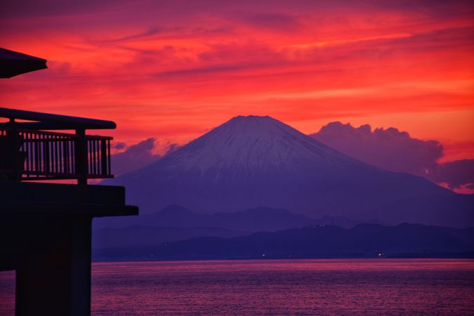 Silhouette of volcano during sunset