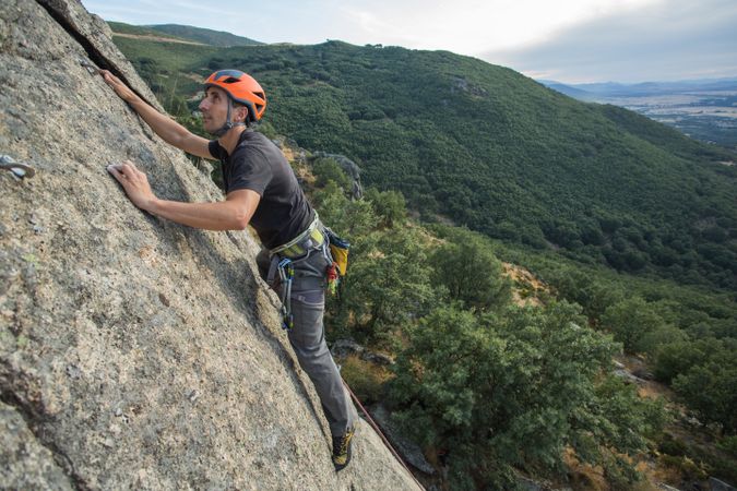 Man climbing a rock