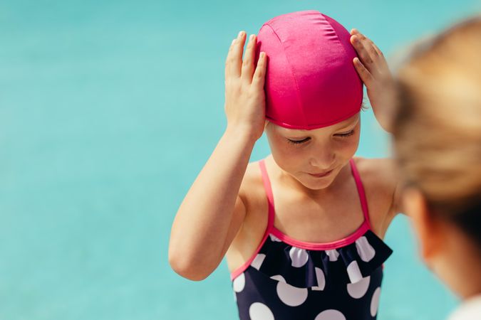 Young girl getting ready for swimming lessons