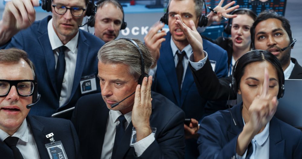 Historical Stock Exchange Depiction of an Open Trading Floor Pit with Diverse Group of Traders Executing Buy and Sell Stock Orders with Hand Signals and Verbal Communication with Their Brokers