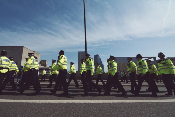 London, England, United Kingdom - April 19th, 2019: Group of British police officers on bridge