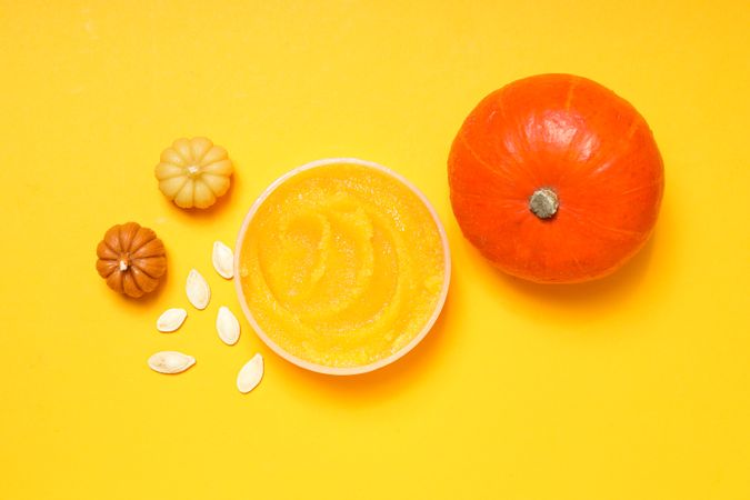 Skin care and face care concept - pumpkin cosmetic