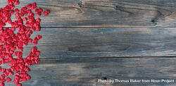 Valentine’s day with little red hearts on blue wood 4jKqvb