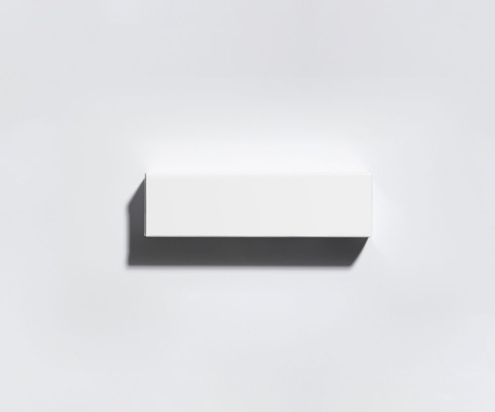 Mockup of a rectangular box for a small cream or toothpaste