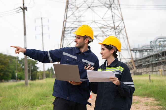 Engineer worker checking project at petrochemical factory or refinery oil plant industrial.