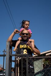 Los Angeles, CA, USA — June 7th, 2020: little girl sitting on her dad’s shoulders at protest rally