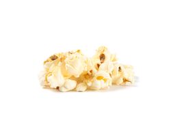 Popcorn pile isolated on blank background, close up