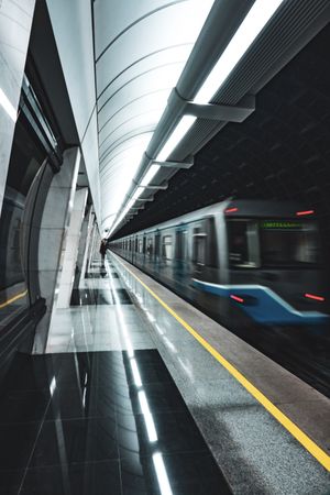 Long exposure of train moving in subway