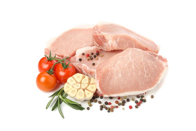 Raw meat for steak and ingredients isolated on light background