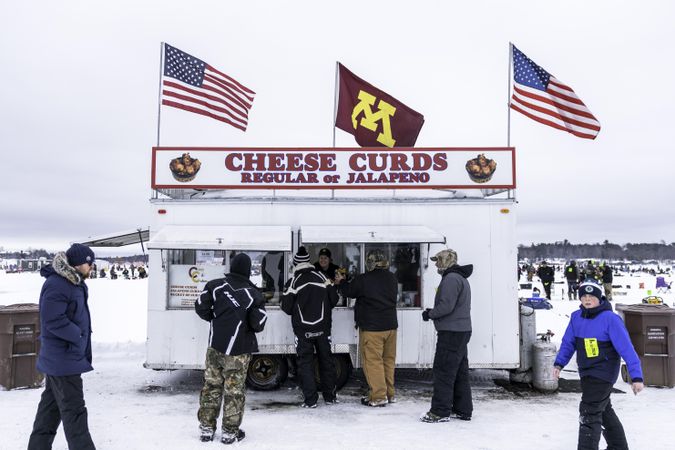 Nisswa, MN, USA - January 25th, 2020: A trailer selling cheese curds at an ice fishing competition