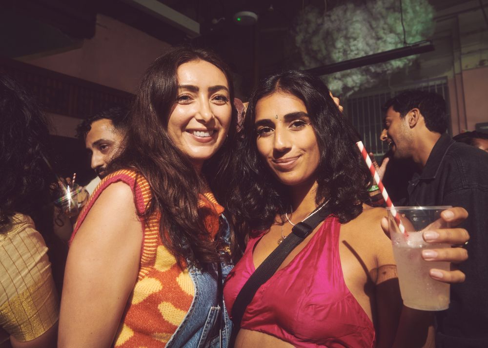 London, England, United Kingdom - Nov 9, 2022: Portrait of two female friends at Dialled In Fest