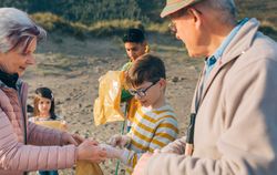 Volunteers preparing to clean the beach
