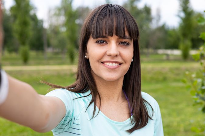 Sport woman taking a selfie on fitness training outdoors