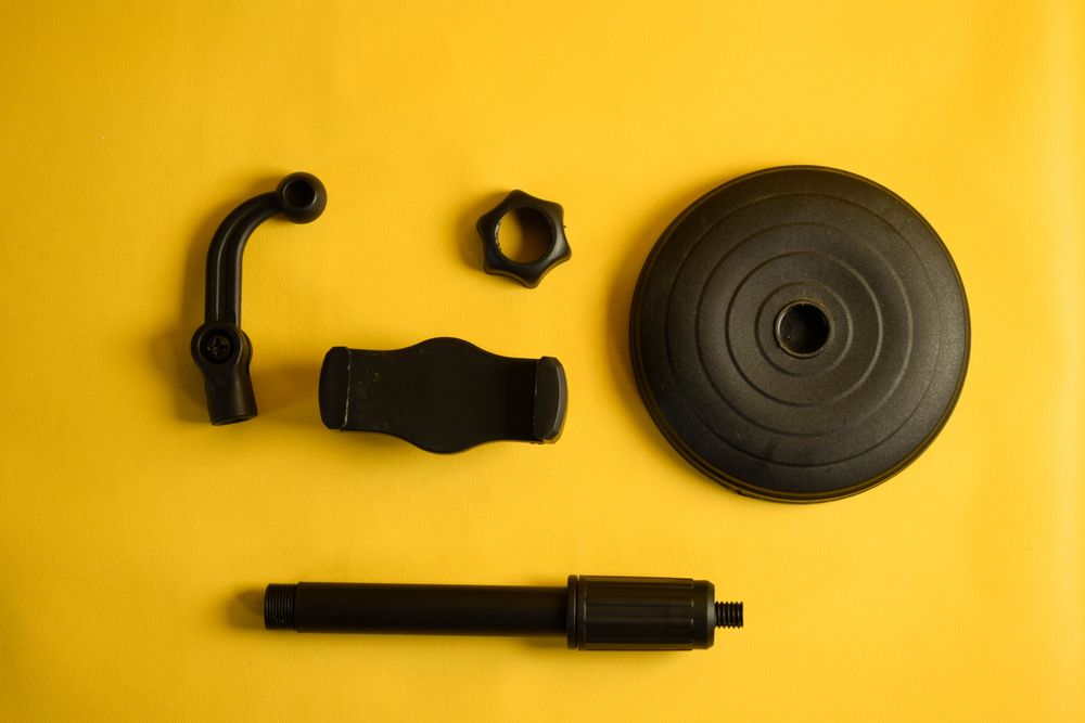 Phone accessories for stand on yellow background