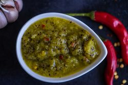 Top view of spicy green Georgian condiment