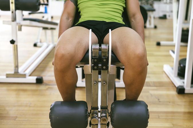 Male’s legs working out using gym equipment